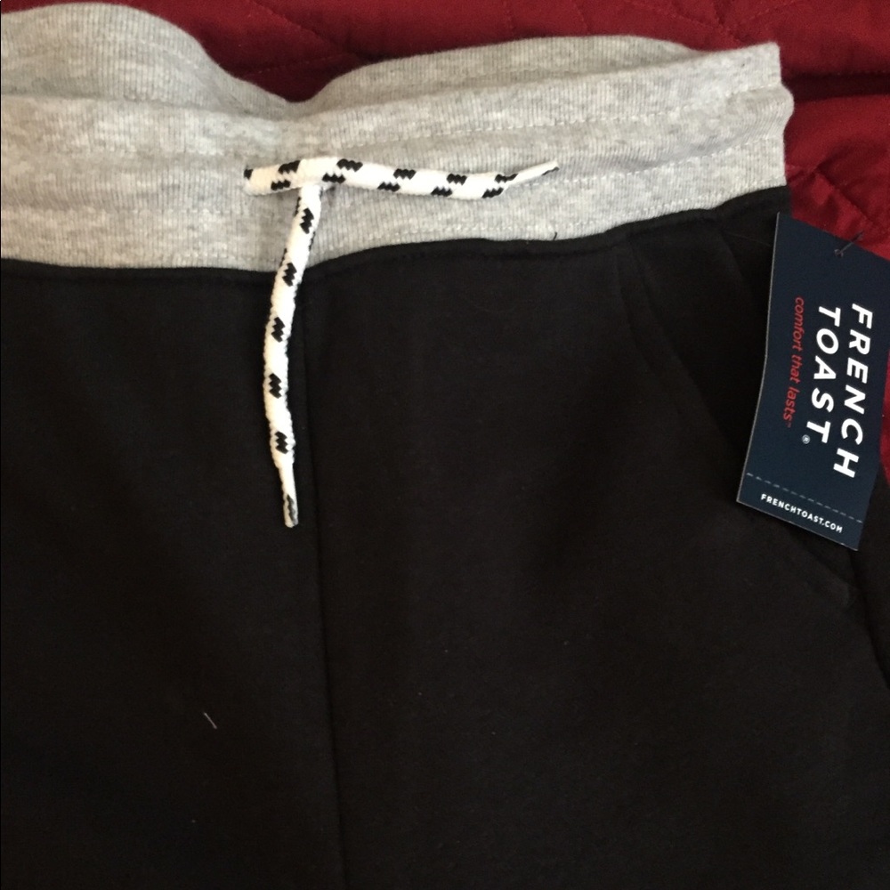 Boys 10/12 black joggers with drawstring waist.